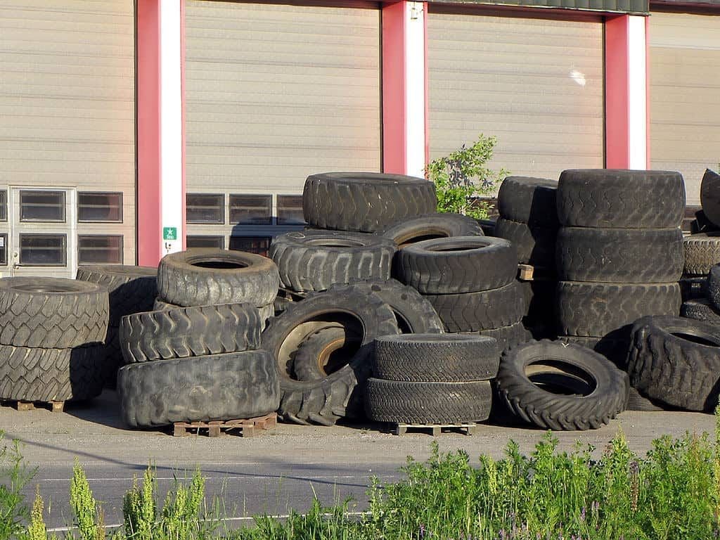 How To Make Rubber Shingles Out Of Old Tires 16 Heap of old black tires - how to make rubber shingles out of old tires