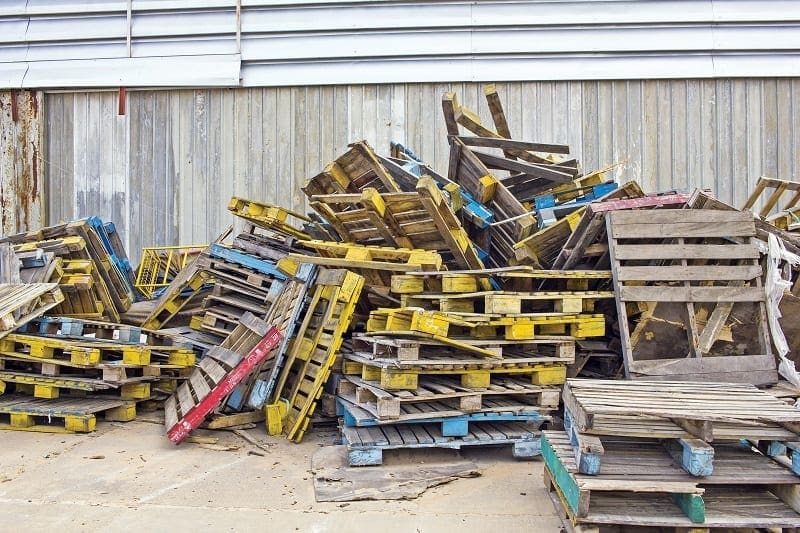 Diy Platform Bed: Create Your Own Queen-Sized Bed From Reclaimed Pallets 3 Stack of discarded coloured pallets - diy platform bed