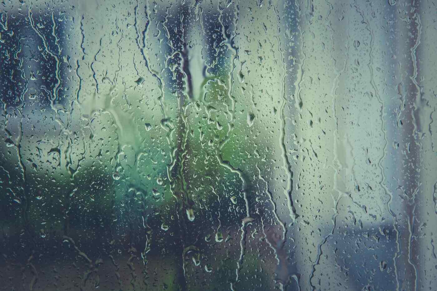 Close up of rainy window pane - benefits of triple-pane windows / image credit: markus spiske