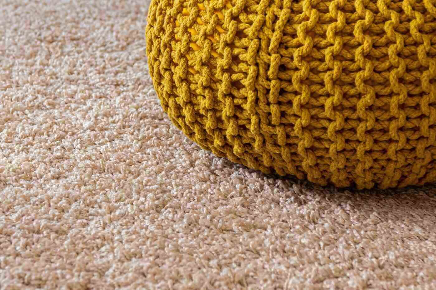 How To Design A Comfortable And Sustainable Bedroom 4 Rug and crocheted cushion - how to design a comfortable and sustainable bedroom