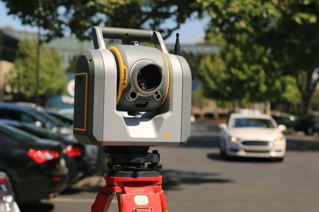 4 Things You Need To Know About Surveying And How It Works 8 Theodolite in parking lot - 4 things to know about surveying and how it works