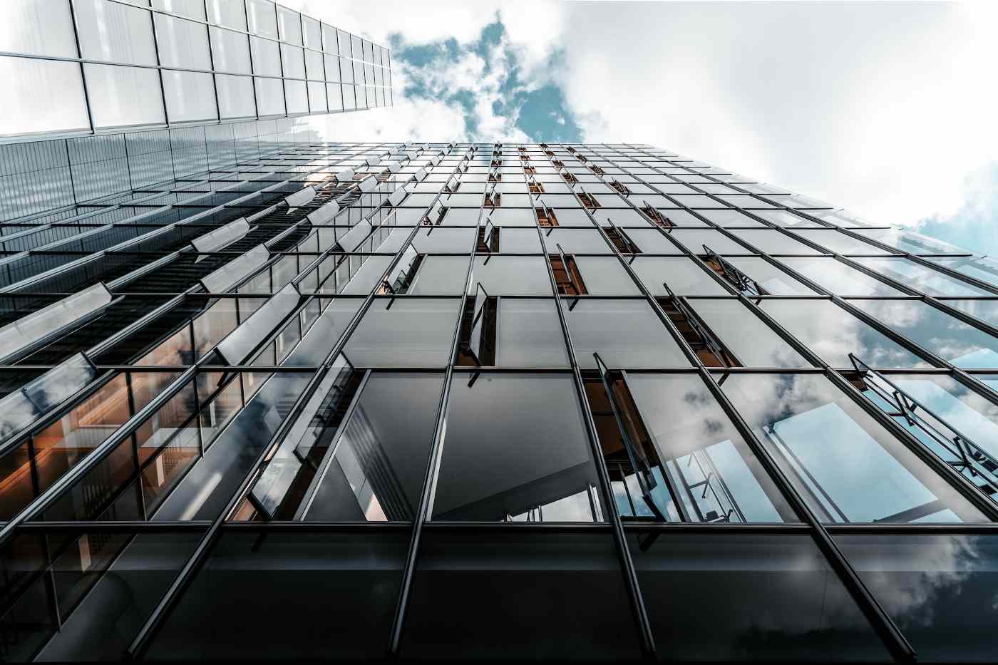 What’s The Most Cost-Effective Renewable Energy Option For Commercial Buildings? 2 Low-angle shot of tall building - most cost-effective renewable energy options for commercial buildings