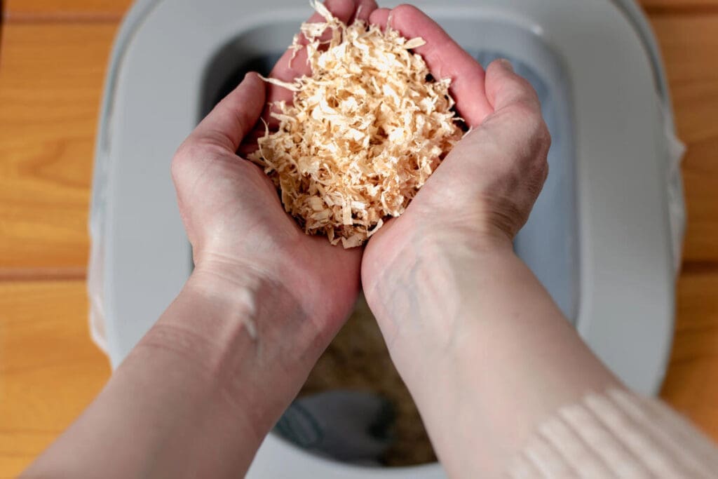 Wood shavings for composting toilet