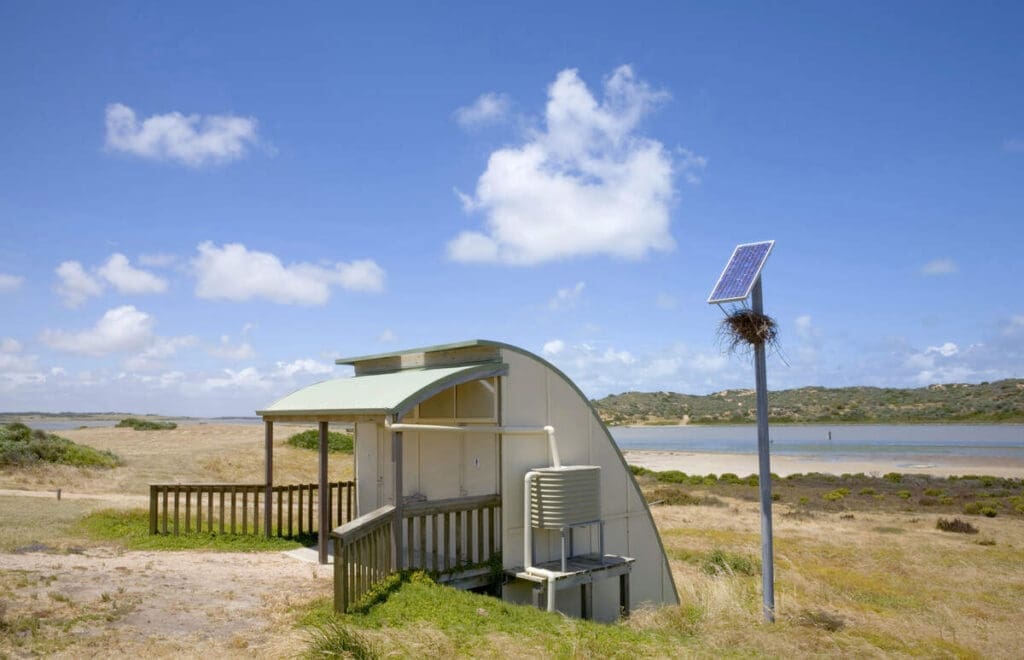 Outdoor solar powered composting toilets