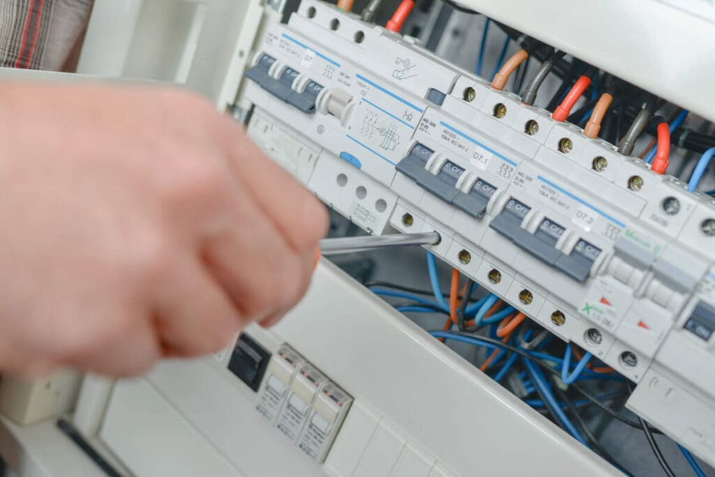 Electrician working electrical panel 1