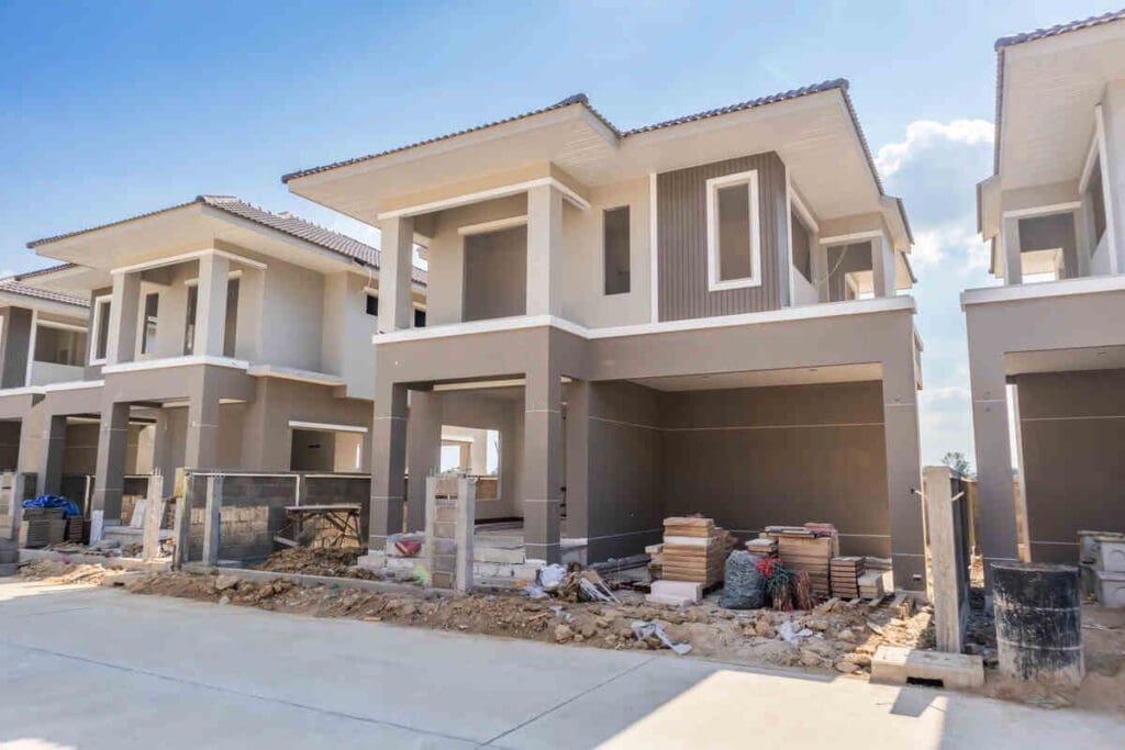 Construction residential new house in progress at building site housing estate development