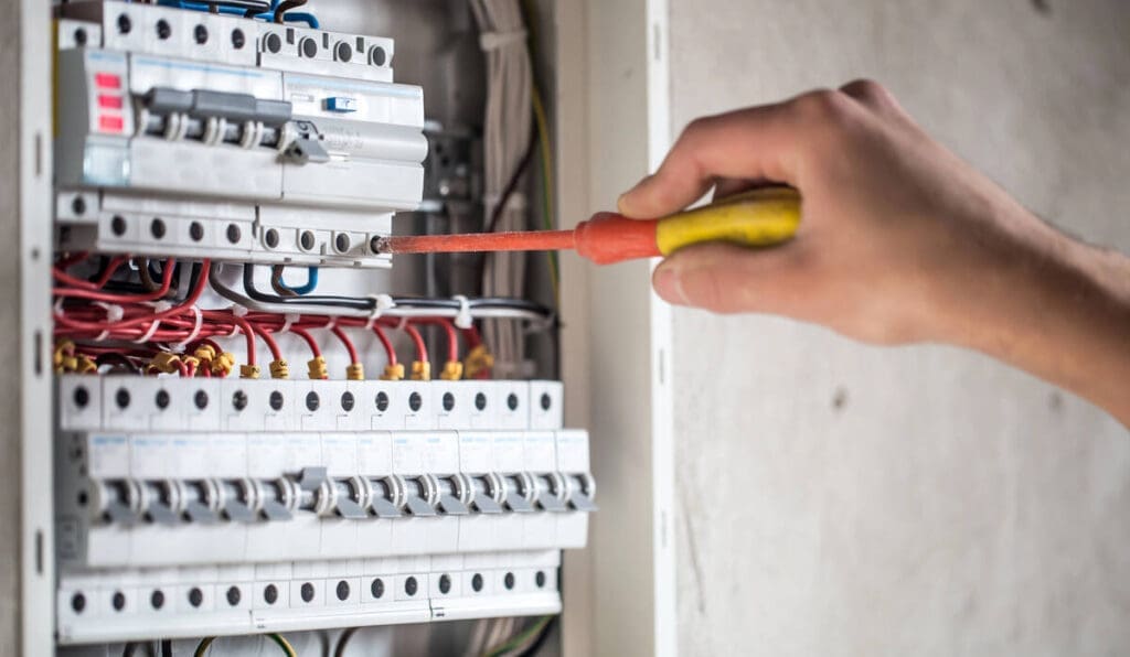 Before You Go All-Electric: What To Know About Your Home’s Wiring 5 Electrician wiring electrical panel