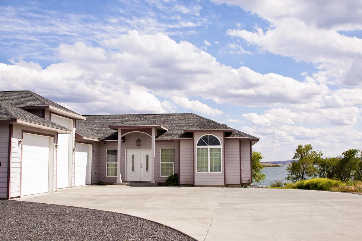 The Average Concrete Driveway Cost In Canada 1 House with concrete driveway