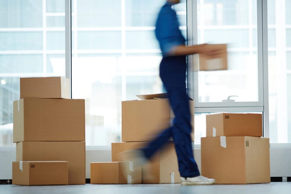 How To Relocate An Office Sustainably 5 Mover moving things - business relocation in progress