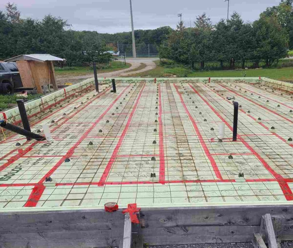 Is A Slab On Grade A Better Option When It Comes To Mitigating Flood Risk? 4 Slab on grade foundation being built