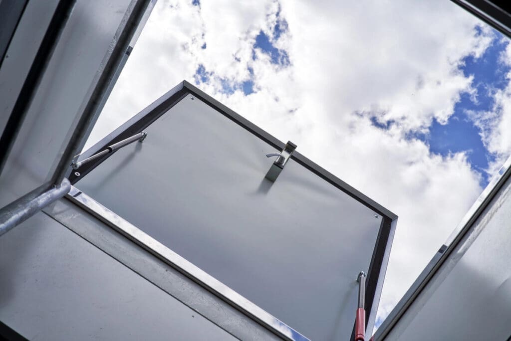 Accessing roof from roof access hatch panel