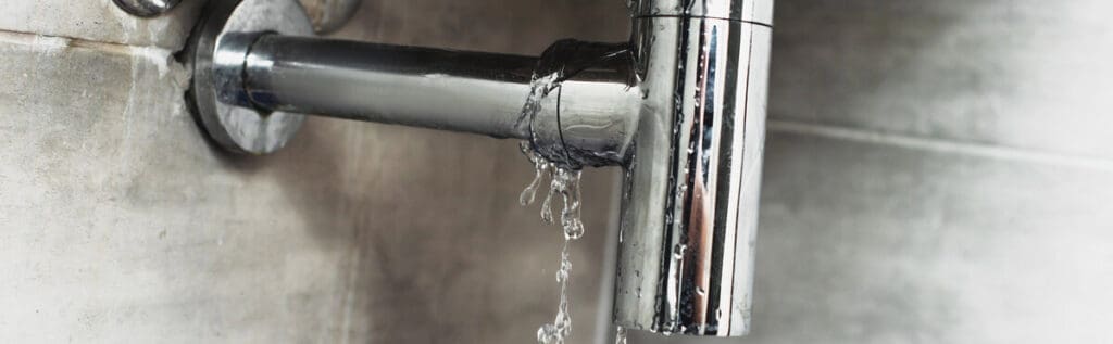 Understanding Common Plumbing Issues 3 Leaky pipe of sink
