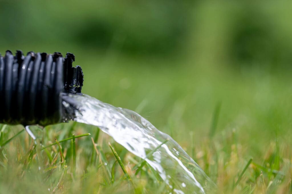 Pipe draining from sump pump