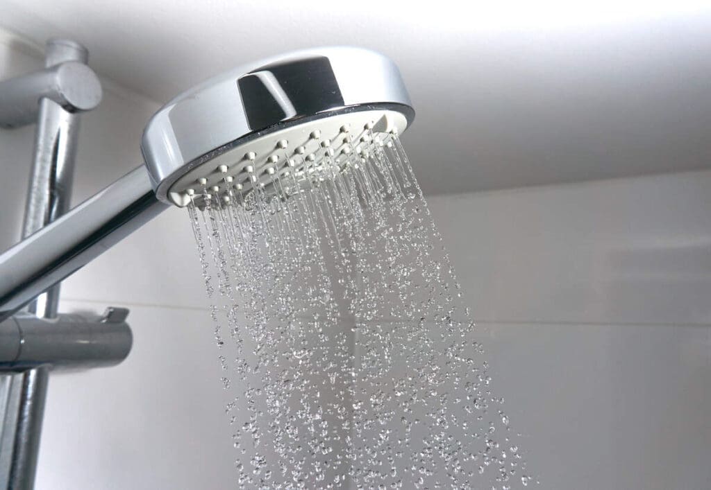 How Drain Water Heat Recovery Systems Turn Wastewater Into Energy Savings 6 Shower head - hot water