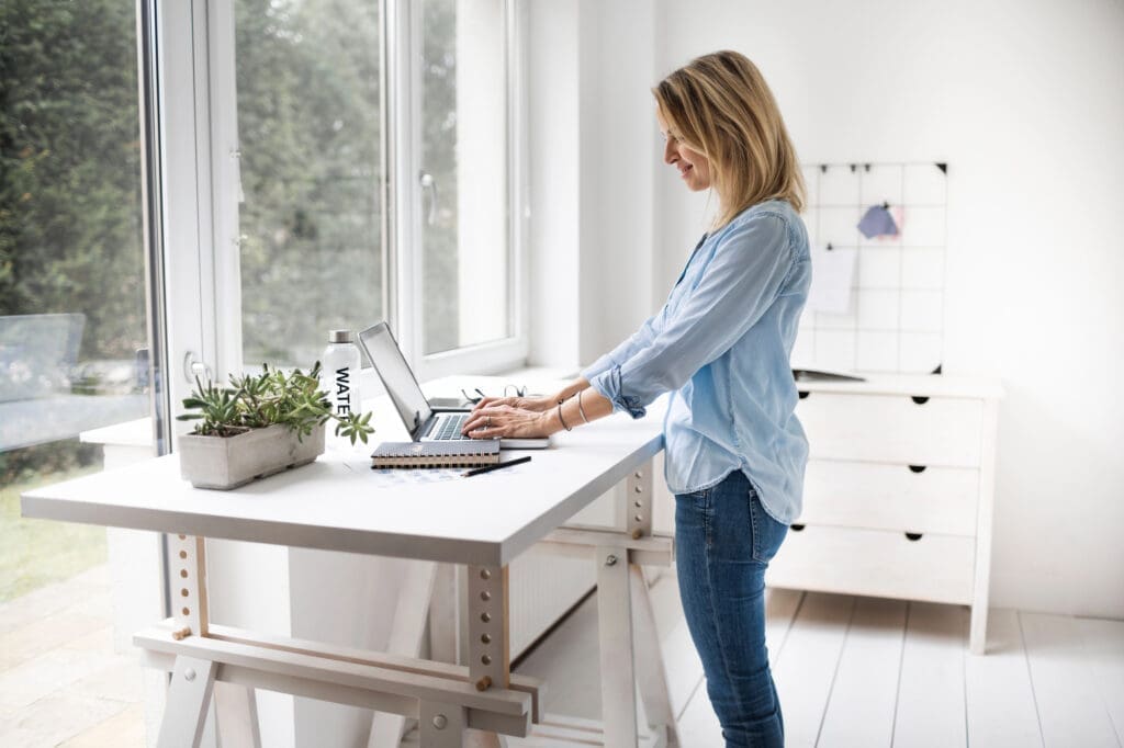 Working at standing office desk