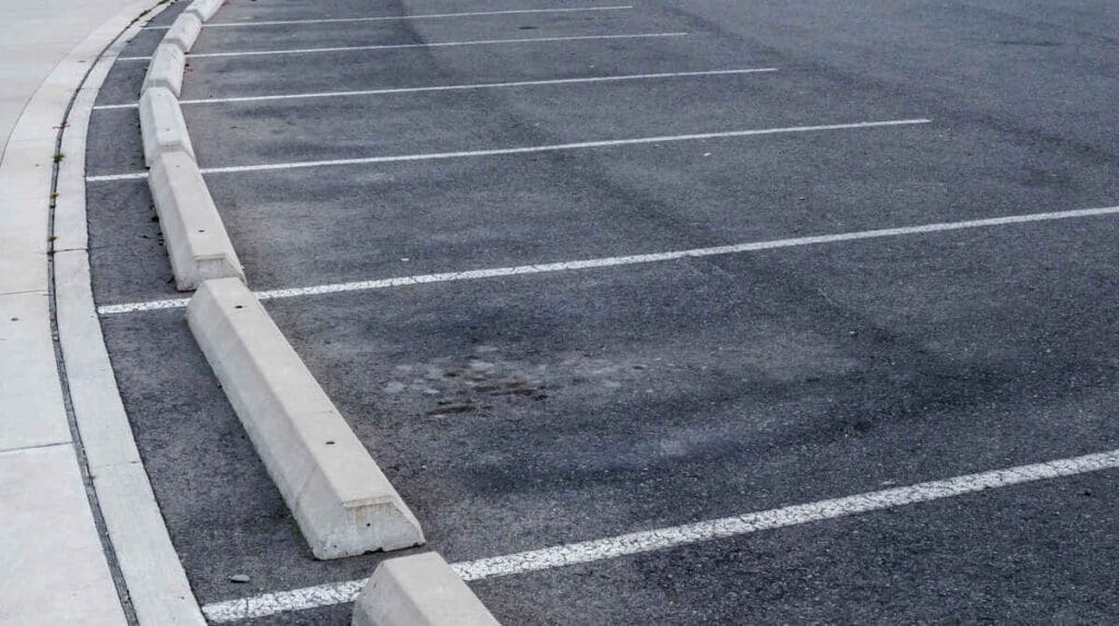 Sealcoating Secrets: Extend the Life of Your Asphalt 5 asphalt parking lot