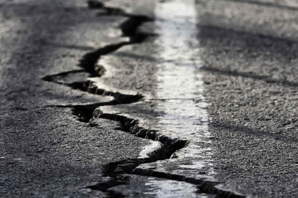 Sealcoating Secrets: Extend the Life of Your Asphalt 4 crack / broken asphalt road