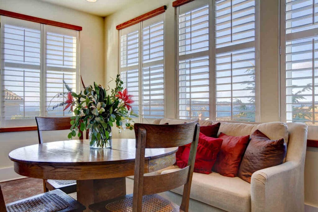 house with light entering solar gain shades