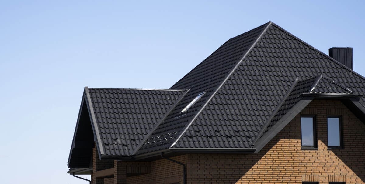 Are Metal Roofs the Answer to Climate Resilience? 1 metal roof of house